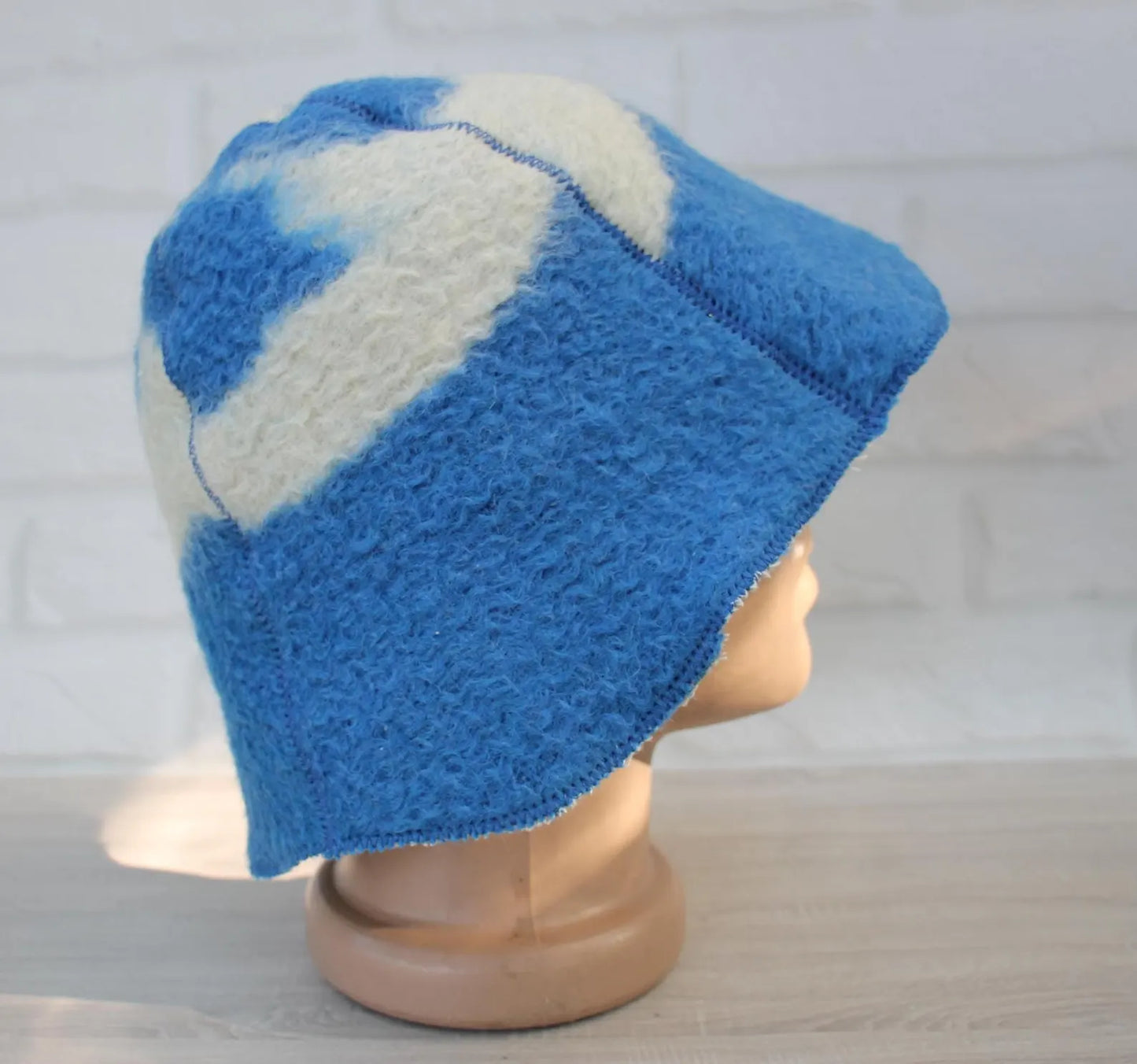 upcycled wool sauna hat in steam bath or sauna setting