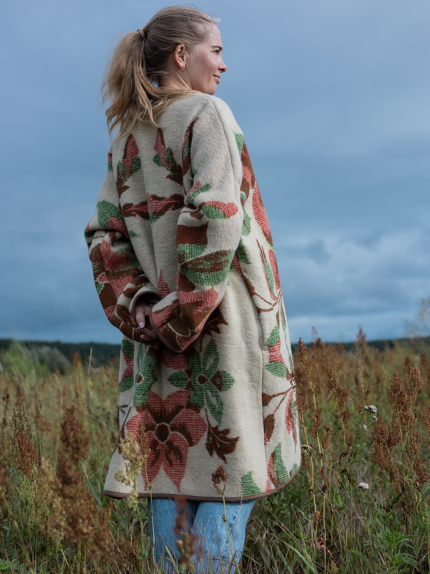 side view handmade upcycled wool coat with brown binding