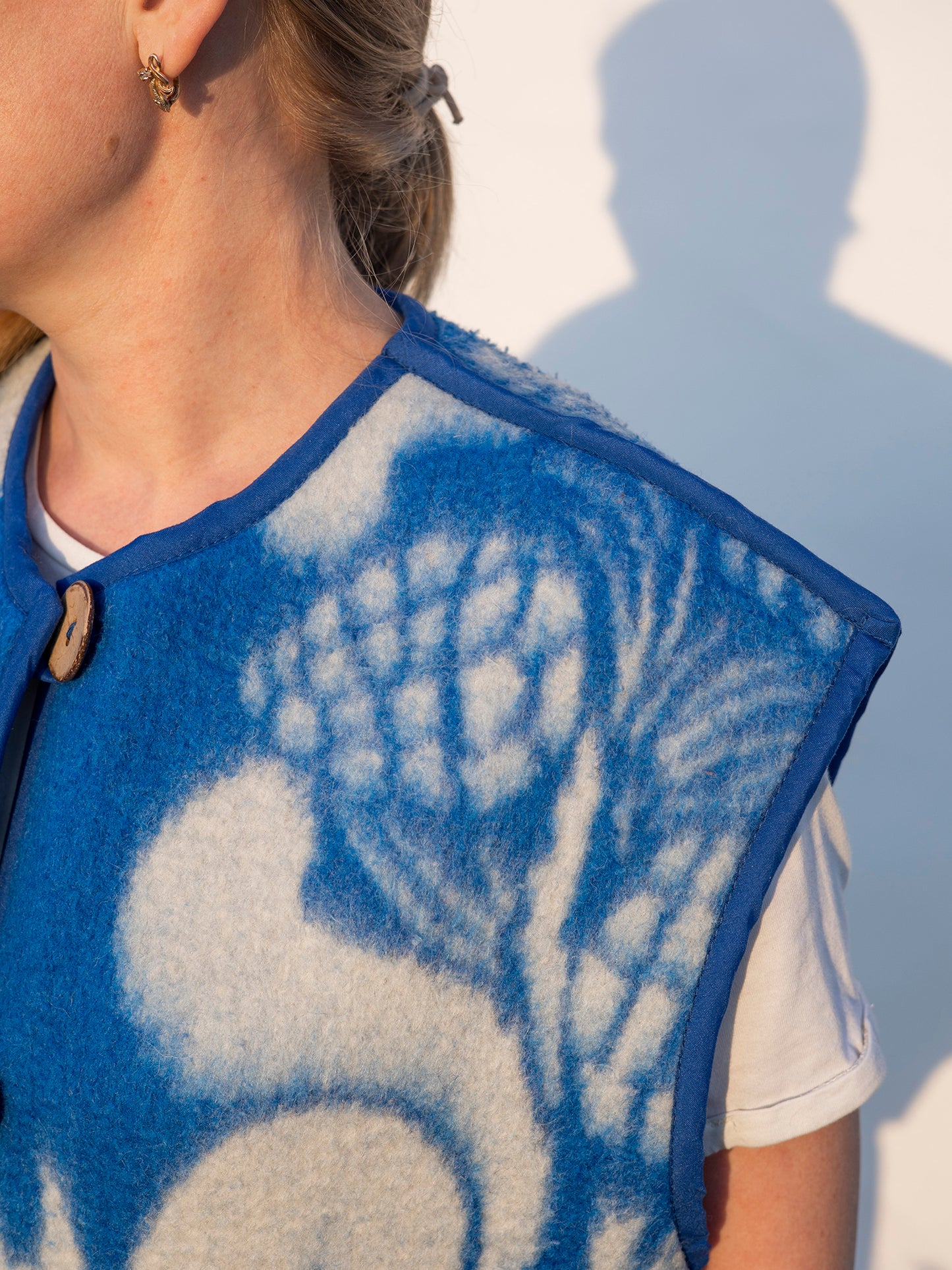 neckline and armhole binding detail upcycled wool vest