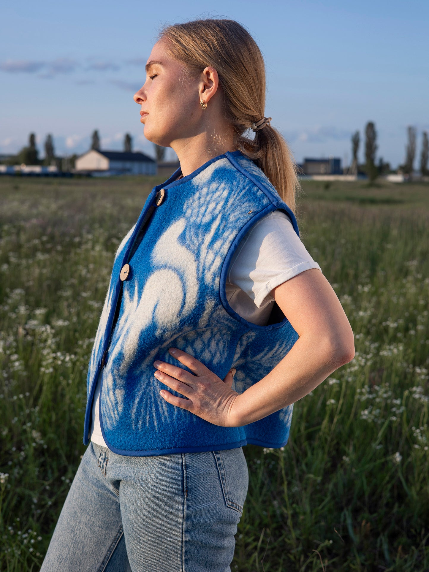 Side view detail squirrel pattern wool vest