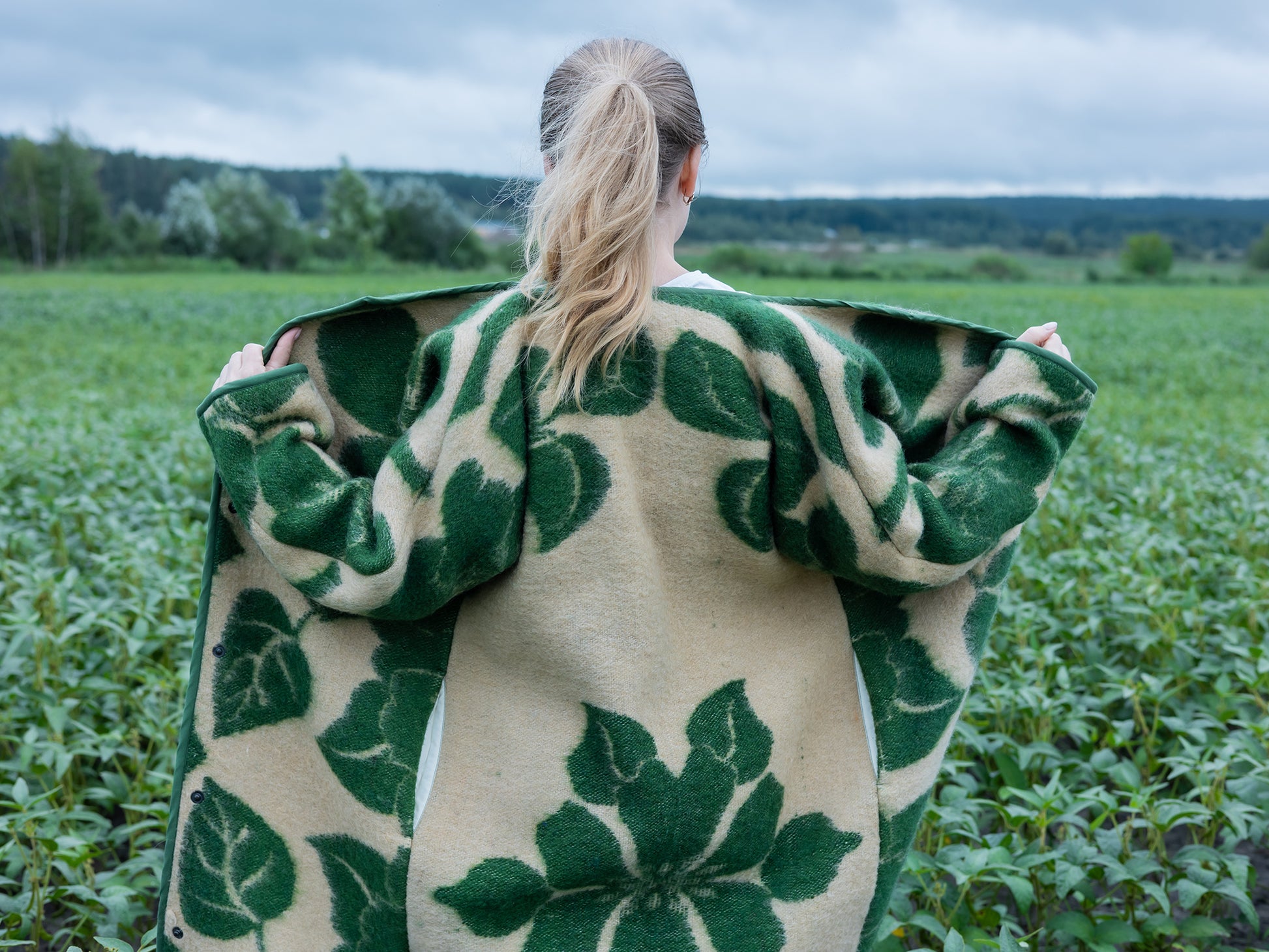 contrast binding and pattern detail on wool blanket coat