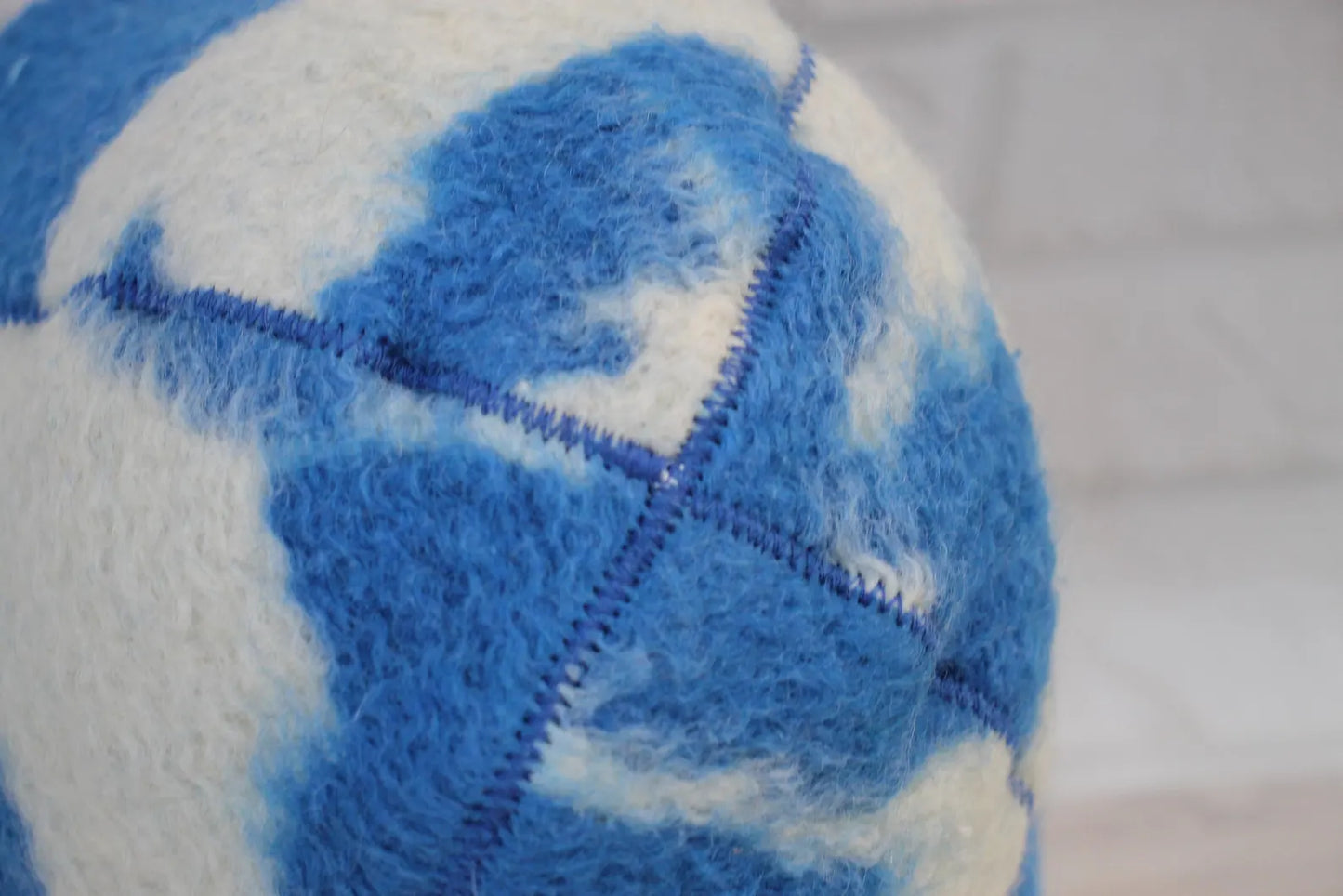 close-up blue and cream pattern vintage wool blanket sauna hat