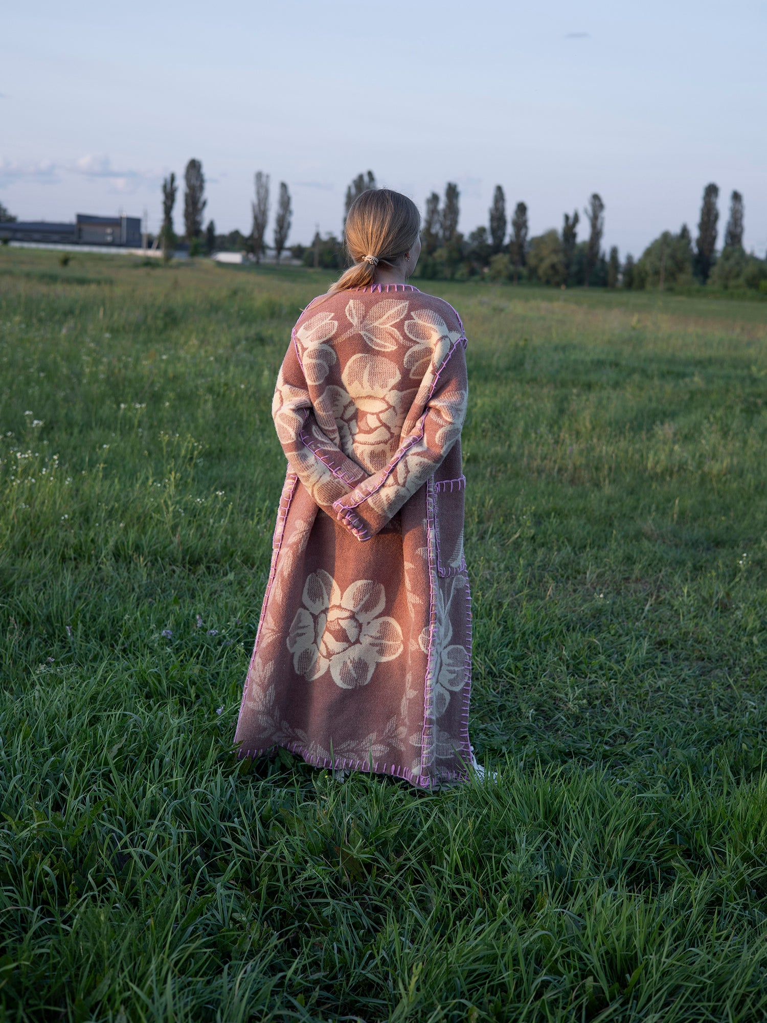 styled outfit long wool blanket coat layered look