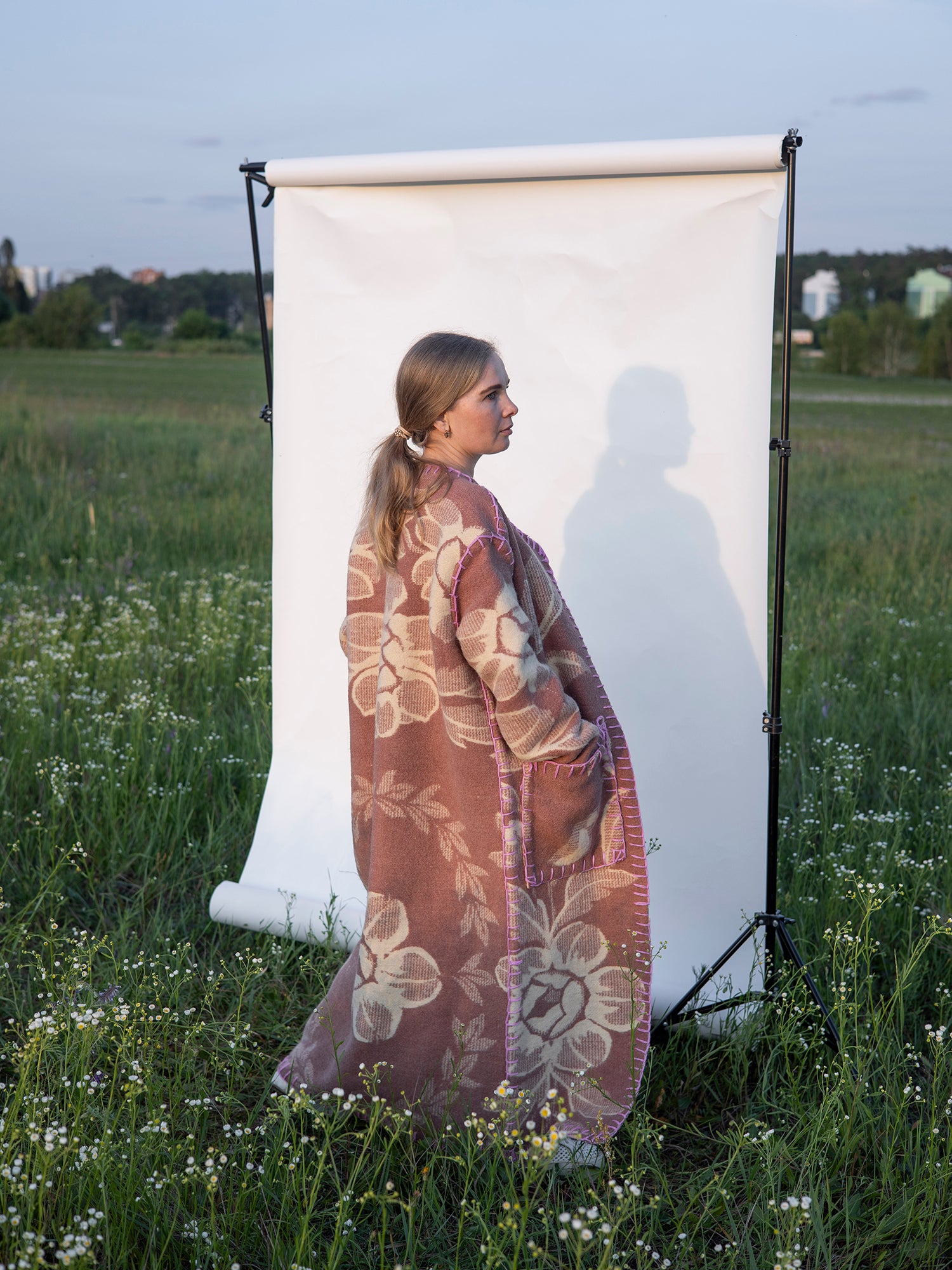 model wearing long vintage wool coat oversized boho style