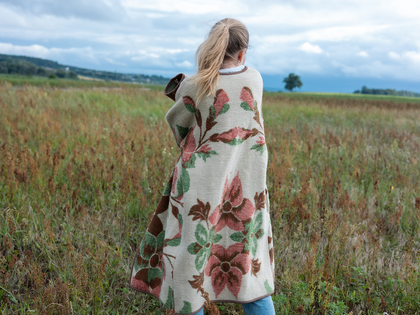 coat laid flat showing straight silhouette and pattern