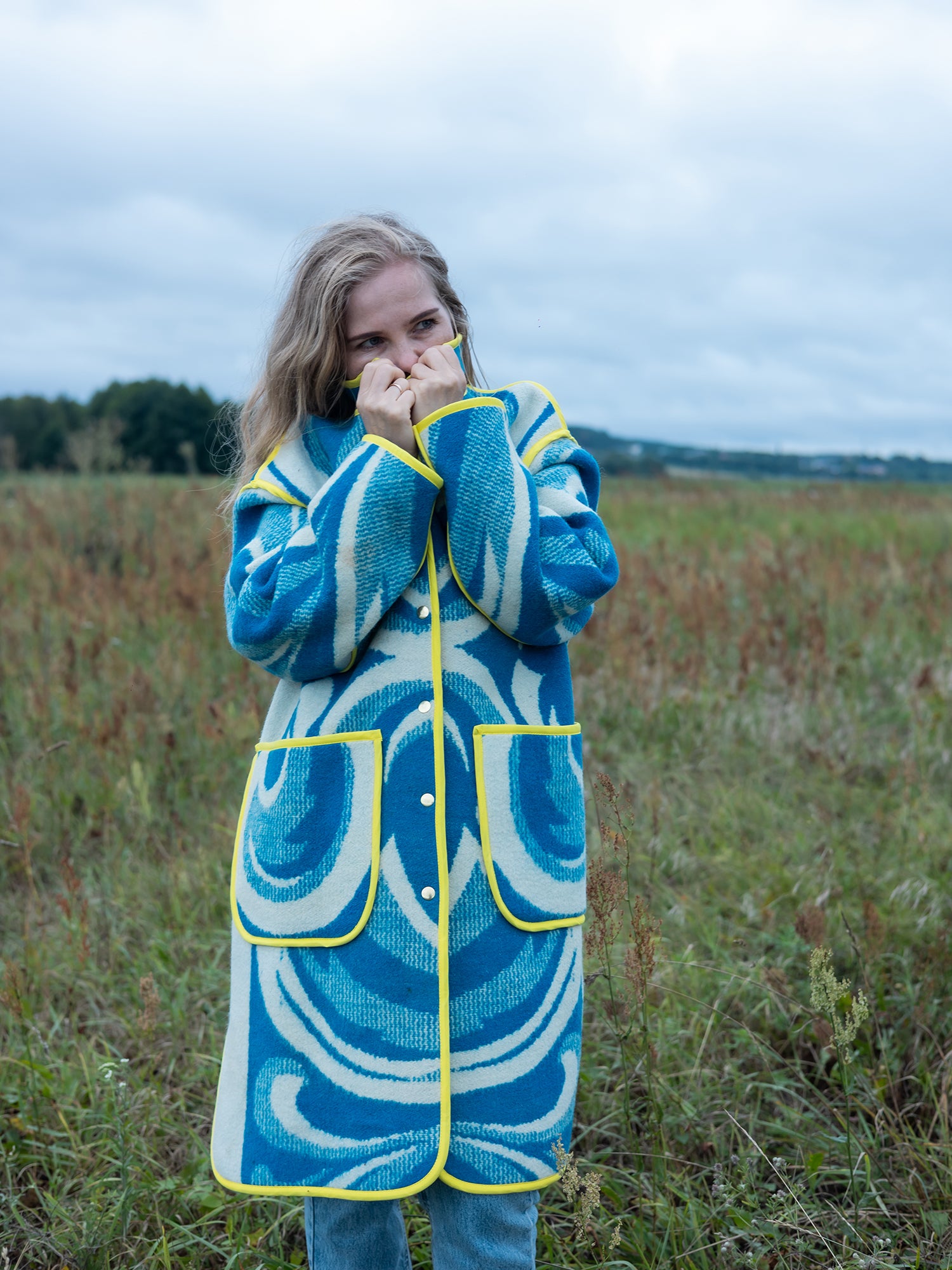 close-up yellow trim on vintage wool blanket coat