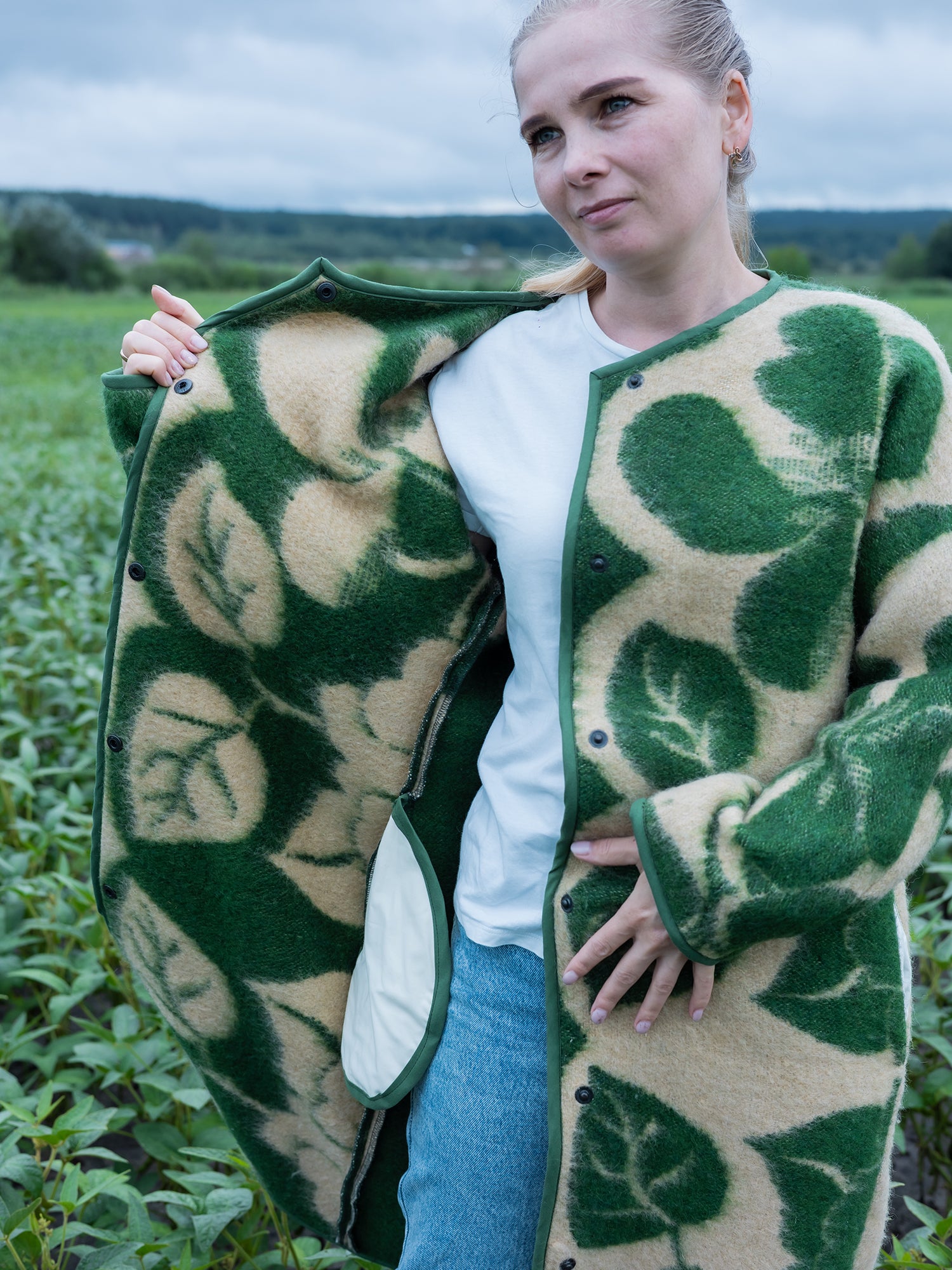 coat laid flat showing full floral pattern upcycled blanket fabric